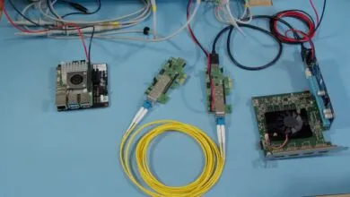 PCIe over fiber setup with Raspberry Pi and fiber optic cables.