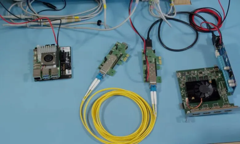 PCIe over fiber setup with Raspberry Pi and fiber optic cables.
