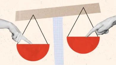 Two hands point to scales, symbolizing balance and decision-making.