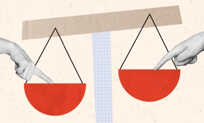 Two hands point to scales, symbolizing balance and decision-making.