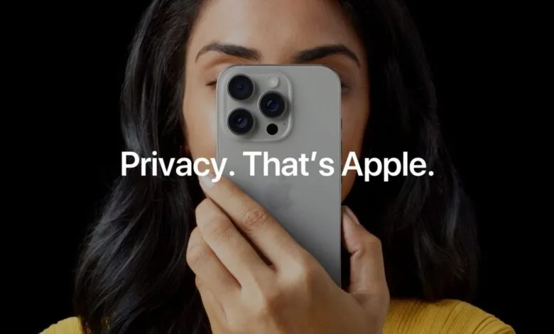 Person holding iPhone 13 Pro covering face, text reads 'Privacy. That's Apple.'