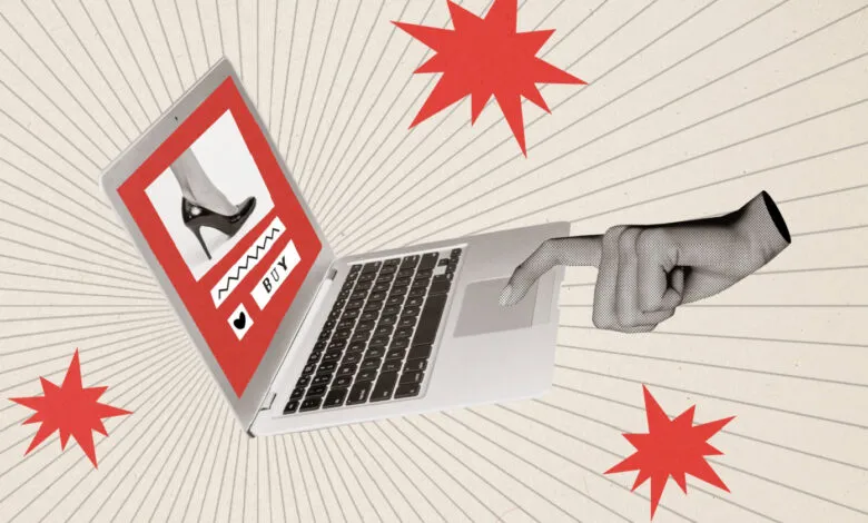 Laptop displaying a shoe ad with a hand clicking the trackpad.