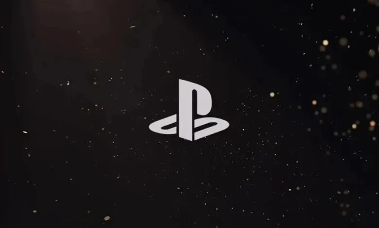 PlayStation logo on dark background with bokeh lights.