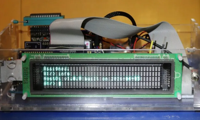 Retro computer display showing 'NostOs v1.0 built on 2026-04-05'.