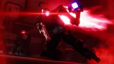 Two armored figures engage in combat, bathed in intense red light.
