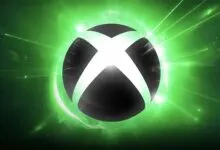 Xbox logo with green energy radiating outwards.