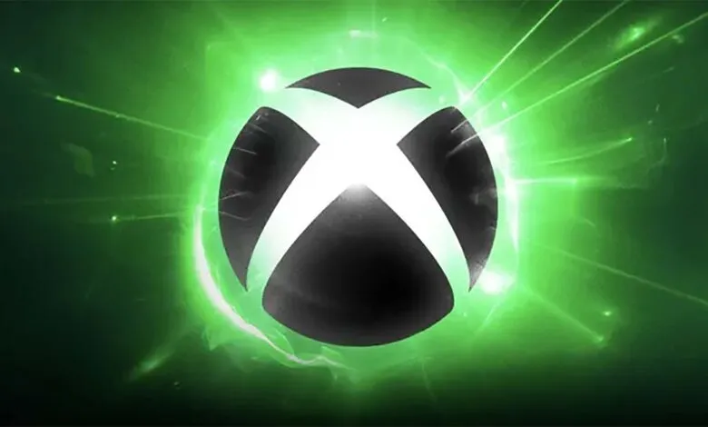 Xbox logo with green energy radiating outwards.