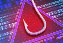 A fishhook hangs over a red warning triangle against a digital background.