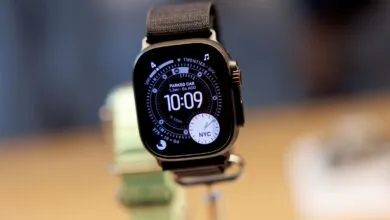 Close-up of an Apple Watch Ultra with a black band displaying 10:09.