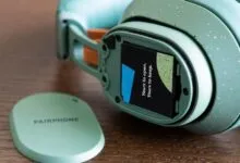 Fairphone Fairbuds XL headphones with removable earcup and battery.