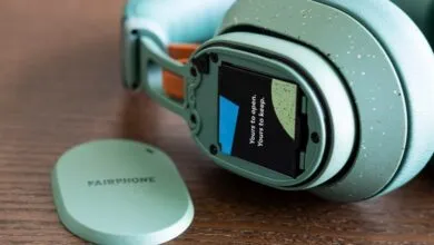 Fairphone Fairbuds XL headphones with removable earcup and battery.