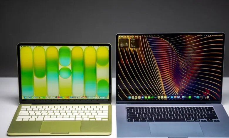 Two open Apple MacBooks, one green and one gray, displaying different wallpapers.