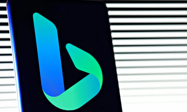 Close-up of a smartphone screen displaying the Microsoft Bing logo.