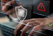 Hands type on laptop with AI shield icon and security alerts/checks overlayed.