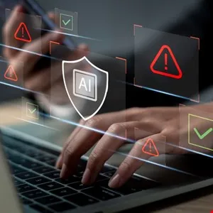 Hands type on laptop with AI shield icon and security alerts/checks overlayed.