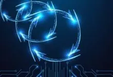 Abstract digital art: blue circuit board with glowing circular arrows above.