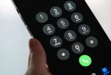 Close-up of a smartphone's dial pad with a green call button.