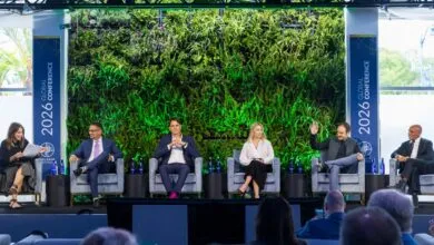 Panel discussion at the 2026 Global Conference with six speakers.