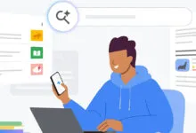 Person using laptop and phone with Google search interface visible.