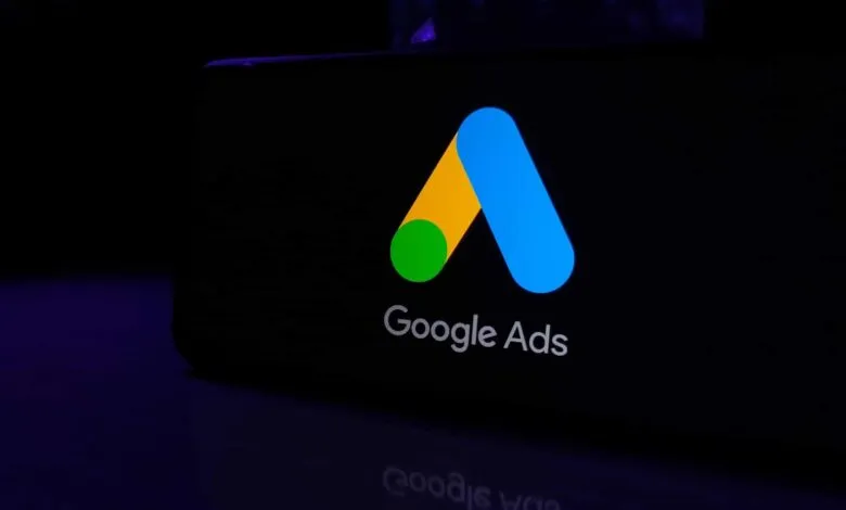 Google Ads logo on a dark screen, green, yellow, blue.