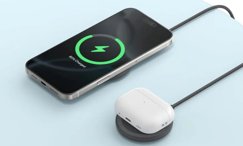 iPhone and AirPods case charging wirelessly on charging pads.