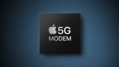 Apple 5G modem chip on a blue background.