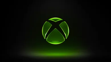 Xbox logo glowing green on a dark background.