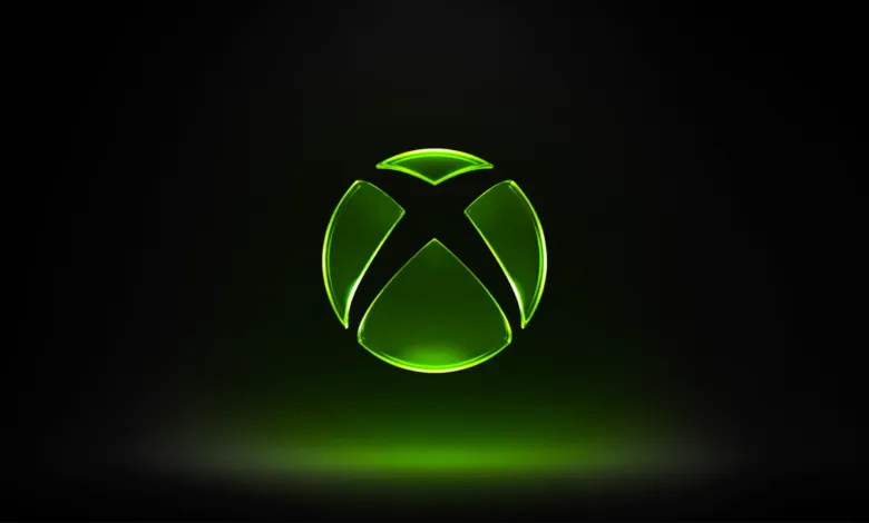 Xbox logo glowing green on a dark background.
