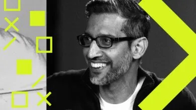 Close-up of Sundar Pichai smiling, with geometric shapes.