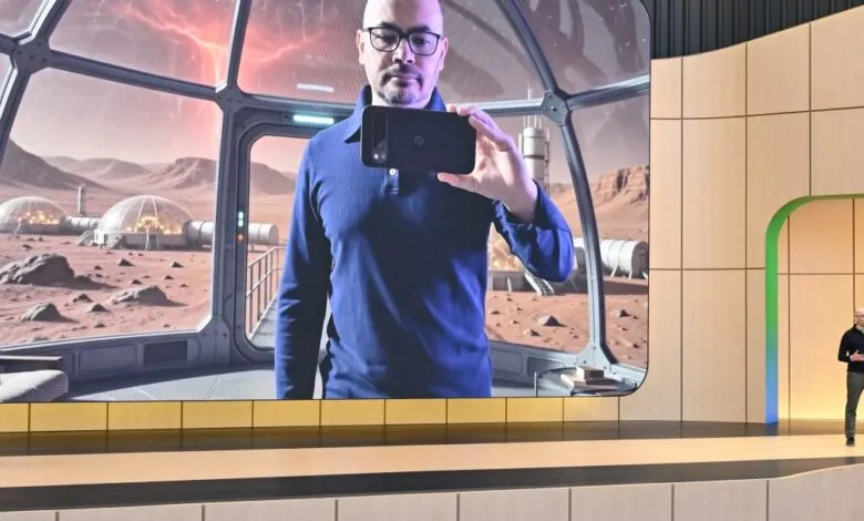 Demis Hassabis presents AI on stage with Mars habitat backdrop.