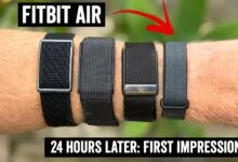 Four Fitbit Air bands on a wrist, showcasing different styles.
