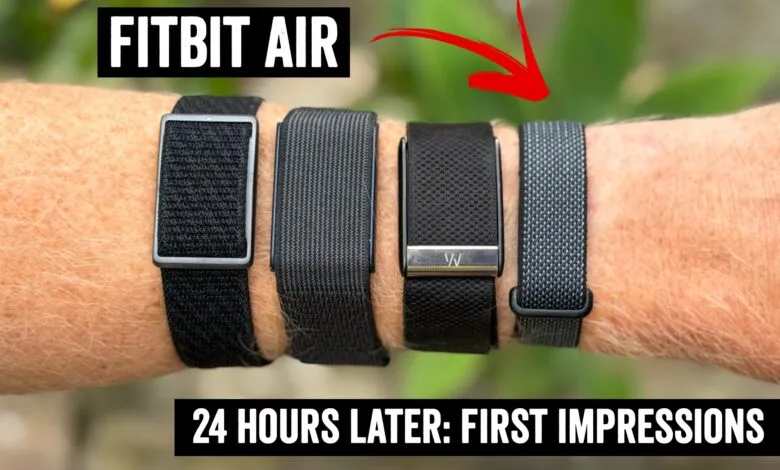 Four Fitbit Air bands on a wrist, showcasing different styles.