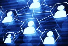 Abstract social network with connected profile icons on blue background.
