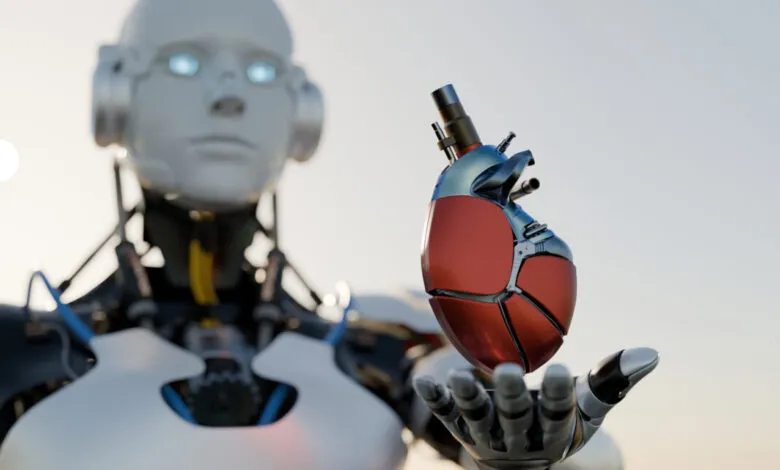 Android robot holding a mechanical heart in its outstretched hand.
