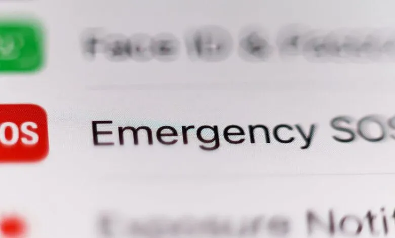 Close-up of a phone screen showing 'Emergency SOS' option.