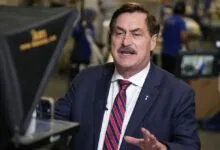 Mike Lindell speaking in front of camera equipment.