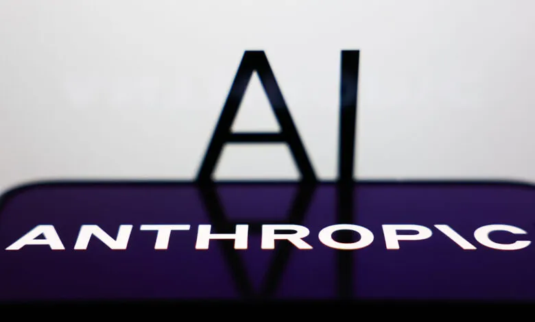 Anthropic AI logo displayed on a phone screen with 'AI' in the background.