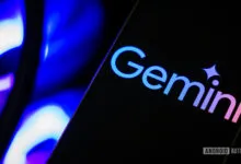 Smartphone displaying the Gemini logo with a vibrant, colorful gradient.