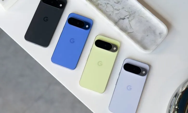 Four Google Pixel phones in different colors: black, blue, green, and lavender.