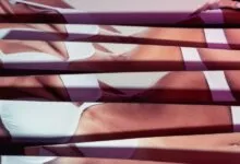 Abstract image of a woman's body in white lingerie, fragmented by horizontal lines.