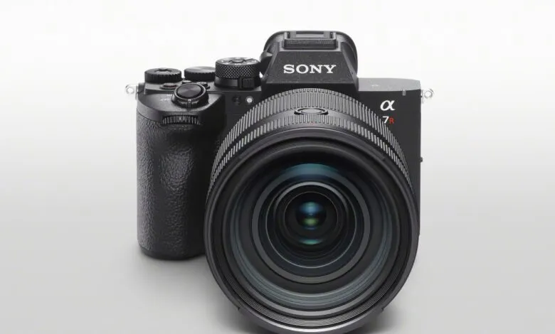 Close-up of a black Sony Alpha 7R camera with a large lens.