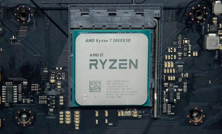 Close-up of an AMD Ryzen 7 5800X3D CPU installed on a motherboard.