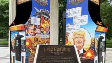 Two 'Epic Furious Strait to Hell' arcade machines with political imagery.