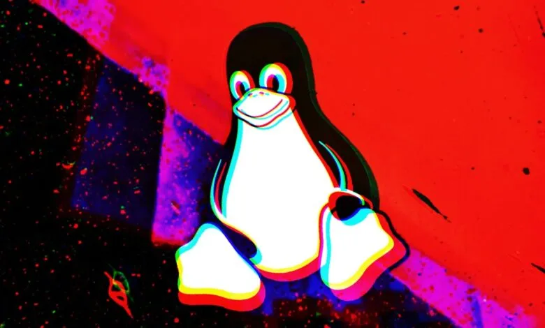 Linux Tux penguin logo with red/cyan glitch effect on colorful background.
