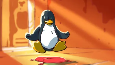 Cartoon Tux penguin meditating on a red cushion in a warm, orange room.