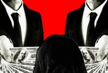 Two figures in suits holding stacks of cash, with a shadowed figure in the foreground.