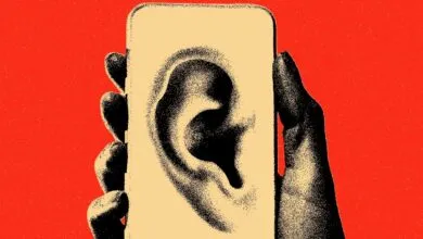 Hand holding phone with large ear graphic, suggesting active listening.