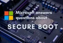 Close-up of a motherboard with Microsoft logo and text about Secure Boot.