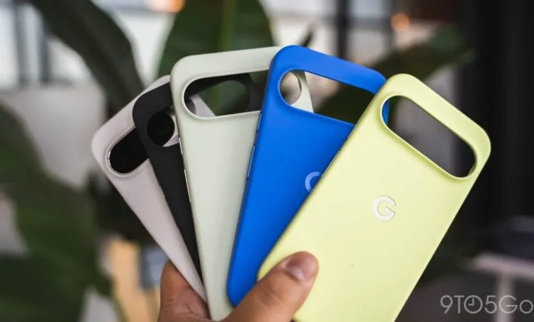 Five colorful Google Pixel phone cases held in a hand.