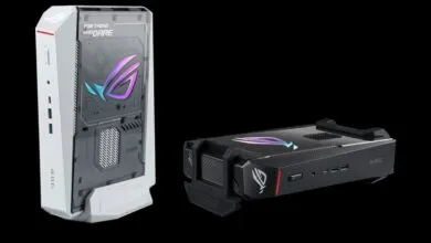 Two ROG NUC gaming PCs, one vertical and one horizontal, on black background.